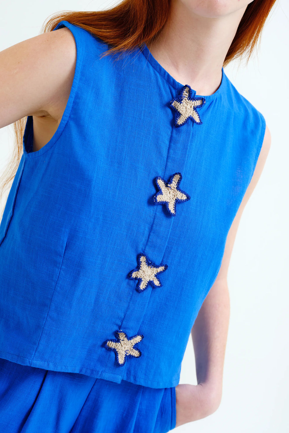 TOP AZZURRO CON STELLE
